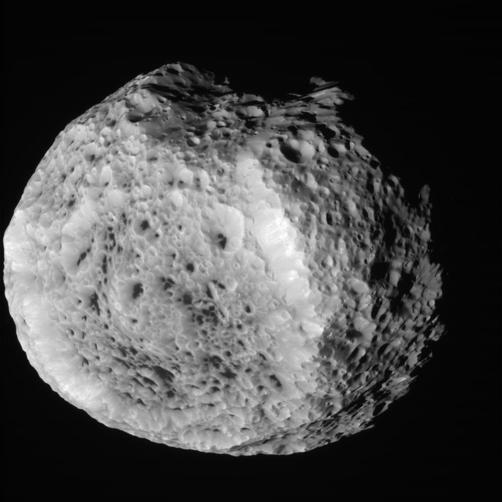 Saturn's Odd Pockmarked Moon Revealed in New Photos